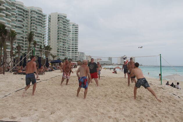 Movement of People at Chacmool Beach in Cancun amid COVID-19. (INT) Movement of People at Chacmool Beach in Cancun amid COVID-19. January 15, 2021, Cancun, Mexico: People having fun at Chacmool beach in Cancun despite COVID-19 pandemic. People are seen playing volley, practicing sports, dancing and enjoying the hot weather and mostly without using masks . Credit: Niyi Fote Thenews2. Movement of People at Chacmool Beach in Cancun amid COVID-19.  Copyright: xNiyixFotex