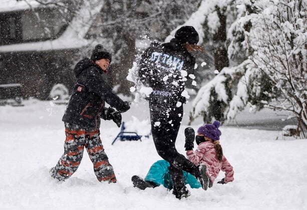 January 16, 2021, Ottawa, on, Canada: Kinsey Sutherland, 13, gets hit with a snowball during a snowball fight with siblings Maxwell, 11, and Elsie, 10, during a major snowstorm in Ottawa on Saturday, Jan. 16, 2021. A snowfall warning is in effect with Environment Canada predicting between 15 to 30 cm of snow by tonight. Ottawa Canada  - ZUMAc35_ 20210116_zaf_c35_026 Copyright: xJustinxTangx