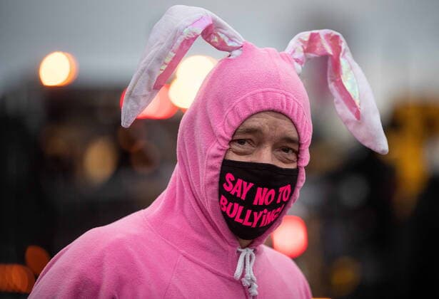 January 17, 2021, Mission, BC, Canada: Oragnzier Clark Jahn wears a bunny suit and an anti-bullying face mask while attending an anti-bullying parade of more than 1,000 vehicles in support of a transgender teenager who was allegedly assaulted outside a school, in Mission, B.C., on Sunday, January 17, 2021. According to RCMP two students were arrested and charges were recommended in regards to the incident that was recorded and posted online. Mission Canada  - ZUMAc35_ 20210117_zaf_c35_045 Copyright: xDarrylxDyckx