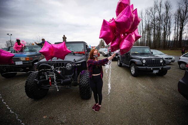 January 17, 2021, Mission, BC, Canada: Rachel Brown holds balloons before riding in an anti-bullying parade of more than 1,000 vehicles in support of a transgender teenager who was allegedly assaulted outside a school, in Mission, B.C., on Sunday, January 17, 2021. According to RCMP two students were arrested and charges were recommended in regards to the incident that was recorded and posted online. Mission Canada  - ZUMAc35_ 20210117_zaf_c35_047 Copyright: xDarrylxDyckx