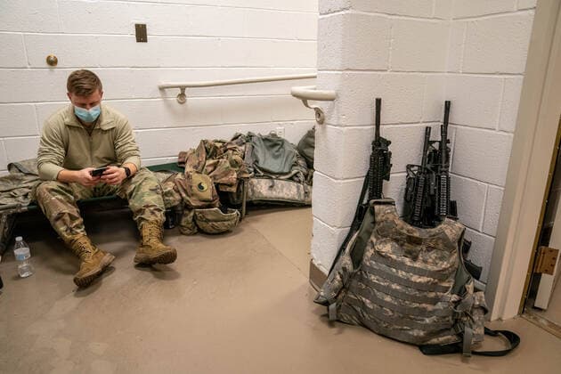 National Guard troops rest up inside the U.S. Capitol ahead of the inauguration for President-elect Joe Biden in Washington, DC on Monday, January 18, 2021. Security is even tighter given the recent events when pro-Trump MAGA mobs breached the security perimeter and penetrated the U.S. Capitol on Jan 6.  WAP20210118519 KenxCedeno