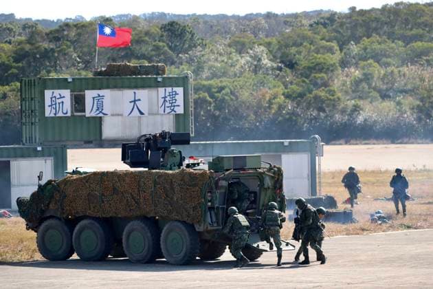 January 19, 2021, Hsinchu, Hsinchu, Taiwan: Tanks and armoured vehicles reclaim a building during the National Army Lunar New YearÃ¢â‚¬â ¢s Military Drill for Preparedness Enhancement 2021 in Taiwan. The Drill deploys armoured vehicles, tanks and military equipments including CM34, CM11, CM22, M1045, and drones for monitoring and reclaiming a building seized by terrorists under simulation as a gesture to improve national security level. Hsinchu Taiwan - ZUMAs313 20210119_zip_s313_012 Copyright: xDanielxCengxShou-Yix