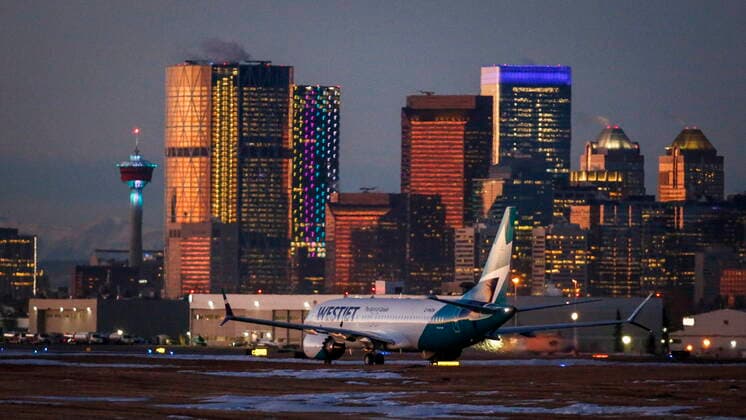 January 21, 2021, Calgary, ab, Canada: The first commercial flight of the Boeing 737 Max in Canada since the aircraft was cleared to fly again in Canadian airspace taxis in Calgary, Alta., Thursday, Jan. 21, 2021. Calgary Canada  - ZUMAc35_ 20210121_zaf_c35_004 Copyright: xJeffxMcintoshx