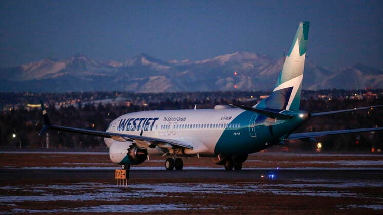January 21, 2021, Calgary, ab, Canada: The first commercial flight of the Boeing 737 Max in Canada since the aircraft was cleared to fly again in Canadian airspace taxis in Calgary, Alta., Thursday, Jan. 21, 2021. Calgary Canada  - ZUMAc35_ 20210121_zaf_c35_005 Copyright: xJeffxMcintoshx