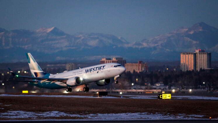 January 21, 2021, Calgary, ab, Canada: The first commercial flight of the Boeing 737 Max in Canada since the aircraft was cleared to fly again in Canadian airspace lifts off in Calgary, Alta., Thursday, Jan. 21, 2021. Calgary Canada  - ZUMAc35_ 20210121_zaf_c35_006 Copyright: xJeffxMcintoshx