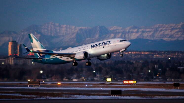 January 21, 2021, Calgary, ab, Canada: The first commercial flight of the Boeing 737 Max in Canada since the aircraft was cleared to fly again in Canadian airspace lifts off in Calgary, Alta., Thursday, Jan. 21, 2021. Calgary Canada  - ZUMAc35_ 20210121_zaf_c35_007 Copyright: xJeffxMcintoshx