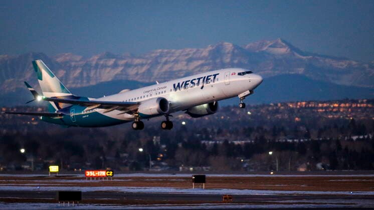 January 21, 2021, Calgary, ab, Canada: The first commercial flight of the Boeing 737 Max in Canada since the aircraft was cleared to fly again in Canadian airspace lifts off in Calgary, Alta., Thursday, Jan. 21, 2021. Calgary Canada  - ZUMAc35_ 20210121_zaf_c35_010 Copyright: xJeffxMcintoshx