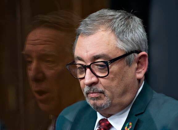 January 21, 2021, Quebec, PQ, Canada: Horacio Arruda, Quebec director of National Public Health looks down as Quebec Premier Francois Legault is reflected in plexiglass during a news conference on the COVID-19 pandemic, Thursday, January 21, 2021 at the legislature in Quebec City. Quebec Canada  - ZUMAc35_ 20210121_zaf_c35_040 Copyright: xJacquesxBoissinotx