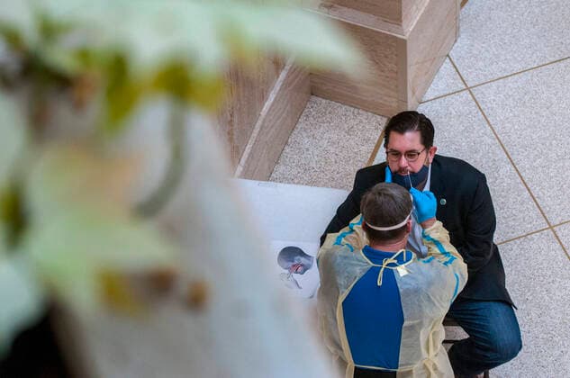 January 22, 2021, USA: House Speaker Brian Egolf takes a COVID-19 test in the Rotunda of the Roundhouse, Friday January 22, 2021. The staff and media are required to take the test each week and legislators are asked to. USA - ZUMAab1_ 20210122_zaf_ab1_001 Copyright: xEddiexMoorex