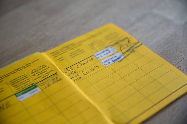 Nuremberg, Germany 23 January 2021 A vaccination card lies on a table, in the vaccination book two vaccinations for Covid 19 are registered, thus the person is protected against an infection with the coronavirus Bavaria Copyright: xFotostandx xK.xSchmittx