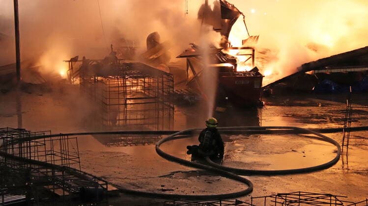 January 23, 2021, Surrey, BC, Canada: Firefighters attend the scene of a fire at AE Concrete in Surrey, B.C. early morning on Saturday Jan. 23, 2021. The three alarm was called bringing over 30 firefighters to the scene. Surrey Canada  - ZUMAc35_ 20210123_zaf_c35_014 Copyright: xShanexMackichanx