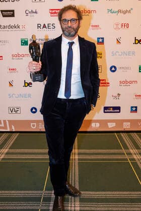 Bart Van Langendonck poses for the photographer with the Best Film Award at the award ceremony of the Ensors Flemish film prizes during the FFO Nights 2021 of the Oostende Film Festival, Saturday 23 January 2021, in Oostende.  NICOLASxMAETERLINCK 2629208