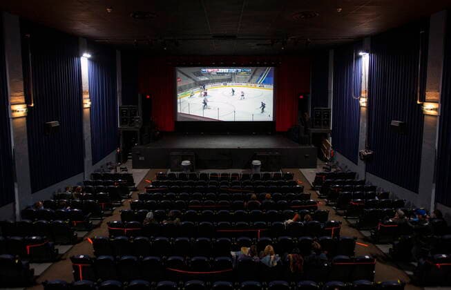 January 23, 2021, Vancouver, BC, Canada: The Vancouver Canucks and Montreal Canadiens NHL game is shown on the Rio Theatre s screen on the theatre s first day open as a sports bar in Vancouver, Saturday, Jan. 23, 2021. Vancouver Canada  - ZUMAc35_ 20210123_zaf_c35_052 Copyright: xMarissaxTielx
