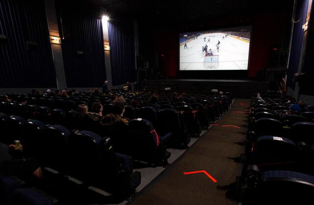 January 23, 2021, Vancouver, BC, Canada: The Vancouver Canucks and Montreal Canadiens NHL game is shown on the Rio Theatre s screen on the theatre s first day open as a sports bar in Vancouver, Saturday, Jan. 23, 2021. Vancouver Canada  - ZUMAc35_ 20210123_zaf_c35_060 Copyright: xMarissaxTielx