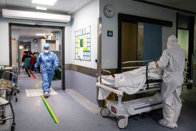 January 23, 2021, Porto, Portugal: A health worker wearing a protective suit attends to an infected patient in a ward at the University Hospital of Sao Joao do Porto..The University Hospital of Sao Joao do Porto, a central hospital in the northern region, receives patients with Covid-19. Portugal currently has 609,136 confirmed cases, 441,556 recoveries and 9,920 death, making it the worst country in the world with the most new cases per million inhabitants. Porto Portugal - ZUMAs197 20210123_zaa_s197_231 Copyright: xRitaxFranÃAx