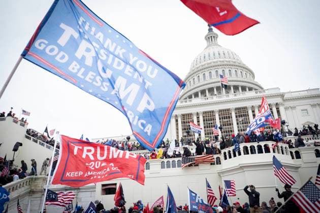 January 6, 2021, Washington, District of Columbia, U.S.A: Insurrection as Trump supporters successfully stormed the U.S Capitol building in order to stop the final election verification. Thousands of hardened Trump supporters stormed the Capitol grounds from both the East and West fronts. Washington U.S.A. - ZUMAf141 20210106_znp_f141_007 Copyright: xMarkxFinkenstaedtx