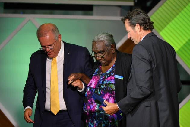2021 AUSTRALIAN OF THE YEAR AWARDS, Prime Minister Scott Morrison and 2020 Local Hero winner Bernie Shakeshaft (R) help 2021 Senior Australian of the Year winner Dr Miriam-Rose Ungunmerr Baumann off the stage during the 2021 Australian of the Year Awards at the National Arboretum in Canberra, Monday, January 25, 2021. ( NO ARCHIVING, EDITORIAL USE ONLY, NO USE IN BOOKS WITHOUT CONSENT CANBERRA ACT AUSTRALIA  Copyright: xMICKxTSIKASx 20210125001515980262
