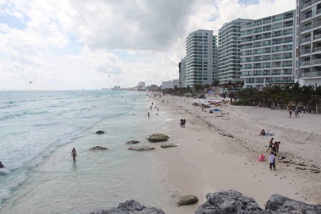 Movement of People at Chacmool Beach in Cancun amid COVID-19. (INT) Movement of People at Chacmool Beach in Cancun amid COVID-19. January 24, 2021, Cancun, Mexico: People having fun at Chacmool beach in Cancun amid COVID-19. People are seen surfing , practicing sports and enjoying the hot weather and most of the people aren™t using masks . Credit: Niyi Fote Thenews2. Movement of People at Chacmool Beach in Cancun amid COVID-19.  Copyright: xNiyixFotex