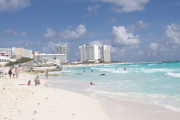 Movement of People at Chacmool Beach in Cancun amid COVID-19. (INT) Movement of People at Chacmool Beach in Cancun amid COVID-19. January 24, 2021, Cancun, Mexico: People having fun at Chacmool beach in Cancun amid COVID-19. People are seen surfing , practicing sports and enjoying the hot weather and most of the people aren™t using masks . Credit: Niyi Fote Thenews2. Movement of People at Chacmool Beach in Cancun amid COVID-19.  Copyright: xNiyixFotex
