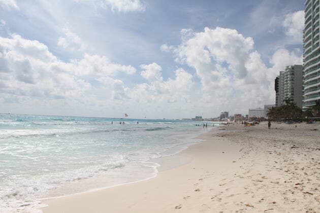 Movement of People at Chacmool Beach in Cancun amid COVID-19. (INT) Movement of People at Chacmool Beach in Cancun amid COVID-19. January 24, 2021, Cancun, Mexico: People having fun at Chacmool beach in Cancun amid COVID-19. People are seen surfing , practicing sports and enjoying the hot weather and most of the people aren™t using masks . Credit: Niyi Fote Thenews2. Movement of People at Chacmool Beach in Cancun amid COVID-19.  Copyright: xNiyixFotex