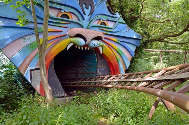 Entering the tunnel of a roller coaster in the former amusement park Spreepark Berlin , former cultural park of the GDR, Germany, Europe mcpins mcpins