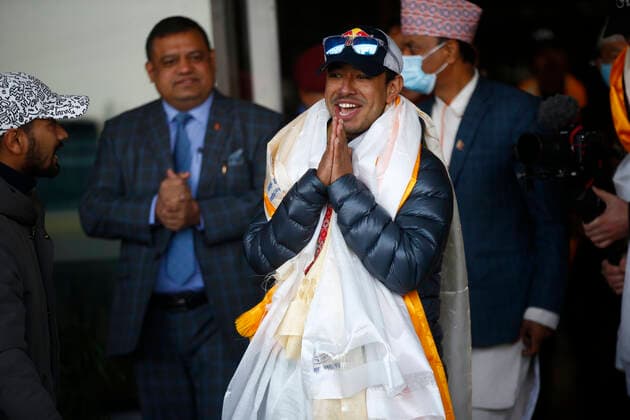 January 26, 2021, Kathmandu, Nepal: Nepalese climber Nirmal Purja, who along with his team recently made history by scaling the K2 summit in the winter season, gestures upon his arrival to Tribhuvan International Airport in Kathmandu, Nepal on Tuesday, January 26, 2021. Kathmandu Nepal - ZUMAg200 20210126_zap_g200_001 Copyright: xSkandaxGautamx