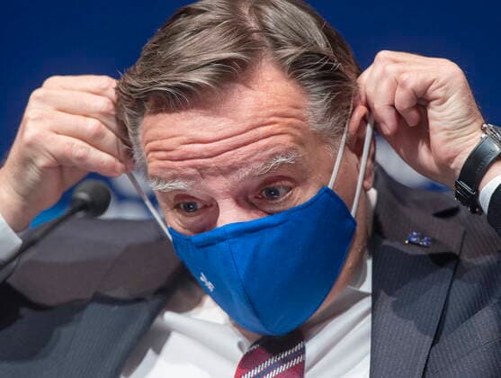 January 26, 2021, Montreal, PQ, Canada: Quebec Premier Francois Legault puts on his face mask after speaking to the media at the COVID-19 press briefing, Tuesday January 26, 2021 in Montreal. Montreal Canada  - ZUMAc35_ 20210126_zaf_c35_027 Copyright: xRyanxRemiorzx