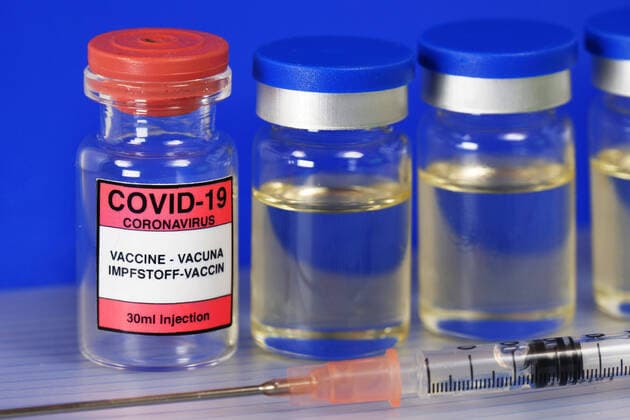 Symbol image Coronaserum vaccine can with syringe Corona vaccine