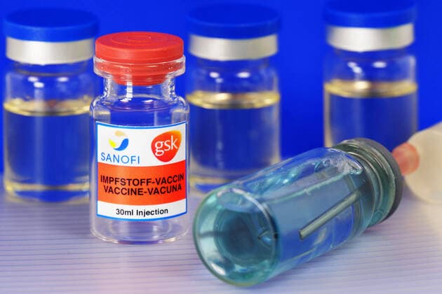 Symbol image Coronaserum vaccine can with syringe Corona vaccine