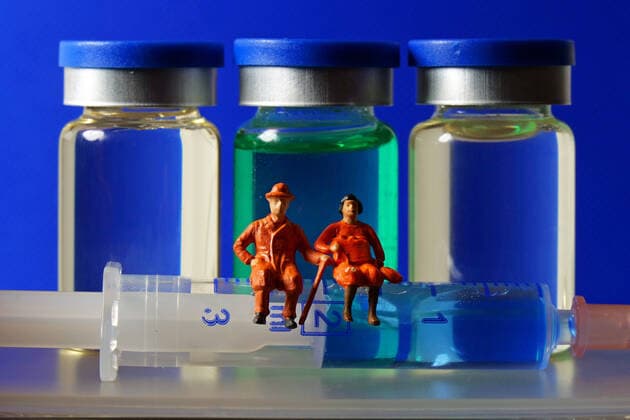 symbol picture corona vaccination with syringe and sitting pensioner on syringe corona vaccine vaccination appointment seniors
