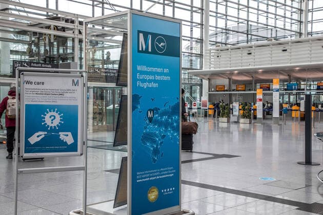 Munich, Germany 01 Feb 2021 Franz Josef Strauss Airport in the state capital Munich, is not very busy due to the second lockdown to fight the Corona pandemic In the picture you can see a sign informing returning travellers that they will be offered a free Corona test Next to it is a sign with the words, W Copyright: xFotostandx xFritschx