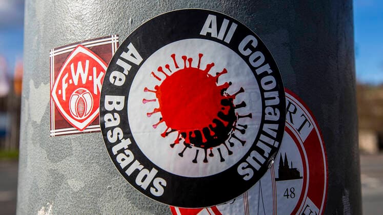 Wuerzburg, Talavera, 04 02 2021, The Corona Mutation from Great Britain and its Influence on the Century Pandemic Picture A sticker on which it says All Coronavirus are Bastards and was stuck on a light post Copyright: HMBxMedia JulienxBecker