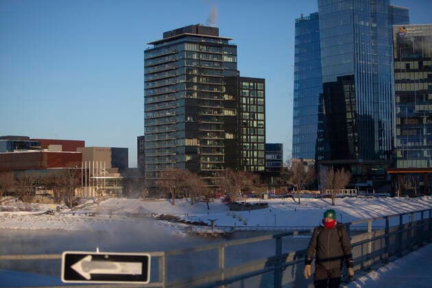 February 5, 2021, Saskatoon, SK, Canada: A pedestrian walks along the Traffic Bridge on the South Saskatchewan River during an extreme cold warning in Saskatoon, Sask. on Friday, February 5, 2021. Saskatoon Canada  - ZUMAc35_ 20210205_zaf_c35_009 Copyright: xKaylexNeisx