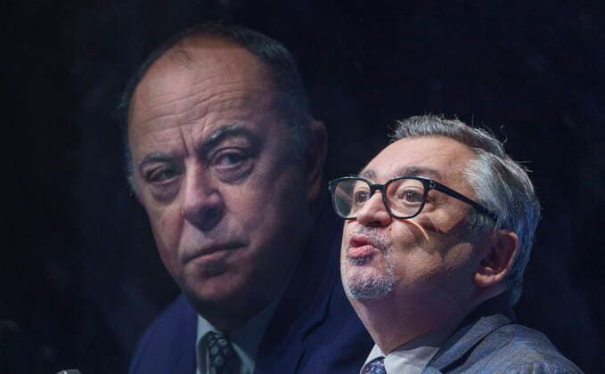 February 5, 2021, Montreal, PQ, Canada: Quebec Minister of Health and Social Services Christian Dube, reflected in a plexiglass barrier, listens to Dr. Horacio Arruda, Quebec s director of public health, during a news conference in Montreal, on Friday, February 5, 2021. Montreal Canada - ZUMAc35_ 20210205_zaf_c35_015 Copyright: xPaulxChiassonx