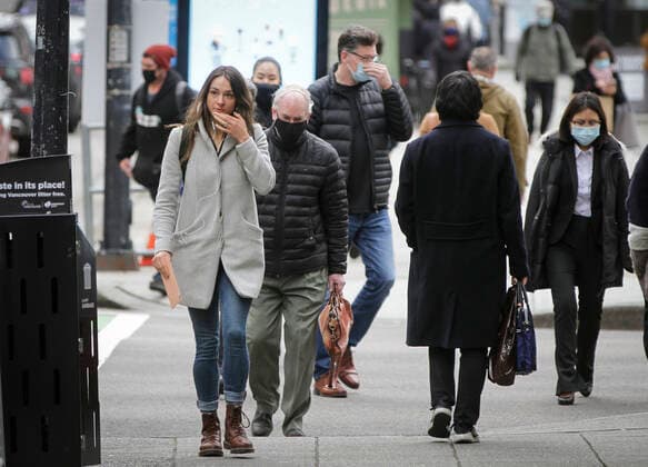 (210205) -- VANCOUVER, Feb. 5, 2021 -- Pedestrians walk along a street in downtown Vancouver, British Columbia, Canada, on Feb. 5, 2021. The unemployment rate in Canada rose by 0.6 percentage point to 9.4 percent in January, the highest rate since August 2020, said official Statistics Canada on Friday. (Photo by Xinhua) CANADA-VANCOUVER-UNEMPLOYMENT RATE-RISING LiangxSen 