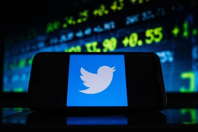 February 7, 2021, Poland: In this photo illustration a Twitter logo seen displayed on a smartphone screen with stock market graphic on the background. Poland - ZUMAs197 20210207_zaa_s197_131 Copyright: xOmarxMarquesx