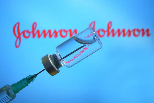 Theme image Johnson and Johnson vaccine disposable syringe and vaccine can with vaccine for injection with a cannula vaccine syringe