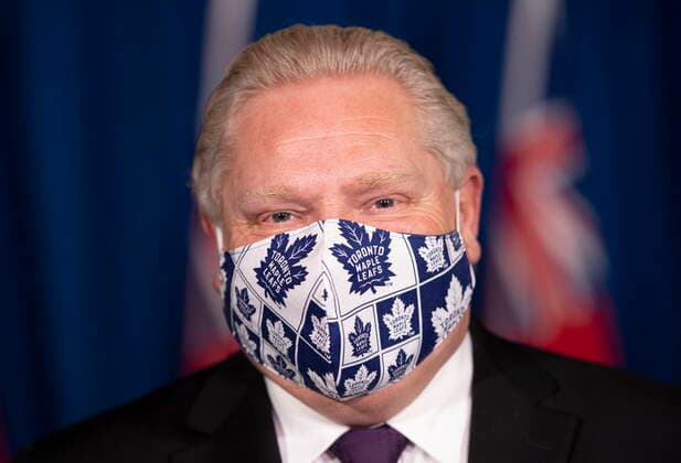 February 8, 2021, Toronto, on, Canada: Ontario Premier Doug Ford wears his Toronto Maple Leafs mask during the daily briefing in Toronto on Monday, February 8, 2021. Toronto Canada  - ZUMAc35_ 20210208_zaf_c35_026 Copyright: xFrankxGunnx