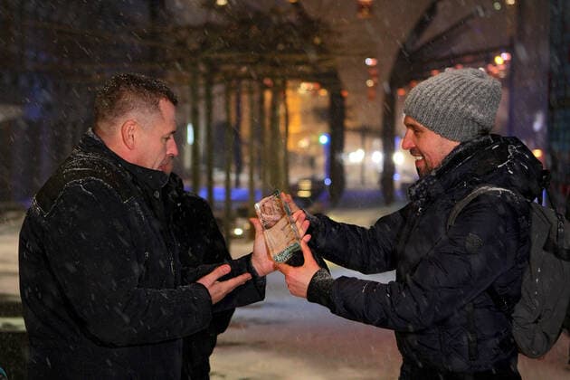 DNIPRO, UKRAINE - FEBRUARY 8, 2021 - Dnipro city head Borys Filatov and lead designer, representative of Expolight Company Mykola Kabluka (L to R) are pictured with the trophy of the LIT Design Awards 2020 claimed in the Landscape Lighting category, Dnipro, central Ukraine. Dnipro wins LIT Design Awards 2020  Copyright: xMykolaxMiakshykovx