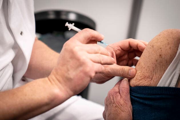 Ropes of 93 years get Modern vaccine from Rúní at the Capital Regions new COVID 19 vaccination center in Idraets Fritidscenter Vejledalen in Ishoej, Tuesday 9 February 2021, Ishoej Denmark  Copyright: RitzauxScanpix MadsxClausxRasmussenx cop103 spdk20210209-110540-L