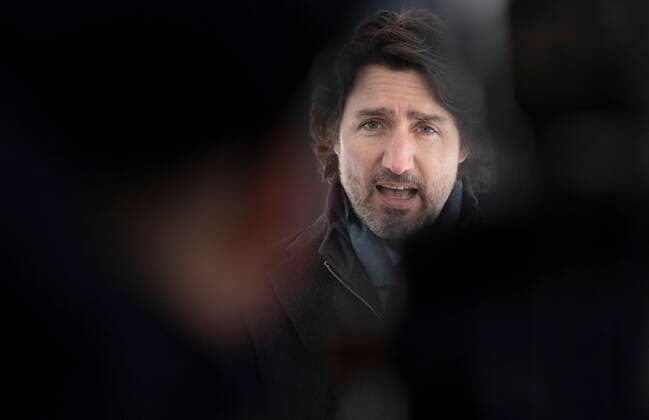 February 9, 2021, Ottawa, on, Canada: Prime Minister Justin Trudeau delivers opening remarks before taking questions from the media outside Rideau Cottage Ottawa, Tuesday, February 9, 2021. Ottawa Canada  - ZUMAc35_ 20210209_zaf_c35_011 Copyright: xAdrianxWyldx