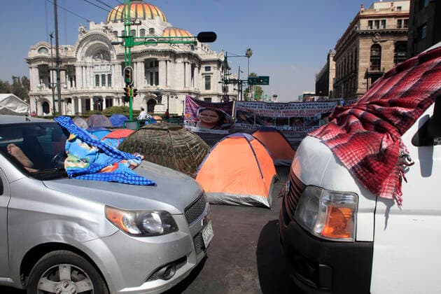 February 9, 2021, Mexico City, Mexico City, Mexico: Demonstrators set up tents in front of the Palacio de Bellas Artes to protest against the gender violence in Mexico on February 9, 2021 in Mexico City, Mexico Mexico City Mexico - ZUMAe321 20210209_zia_e321_037 Copyright: xAngelxMoralesxRizox