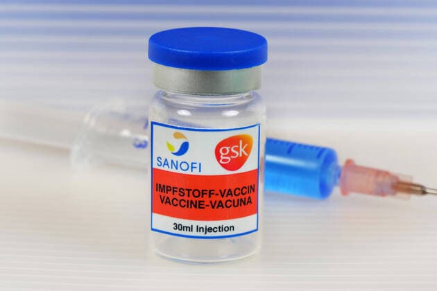 Symbol image Coronaserum vaccine can with syringe Corona vaccine