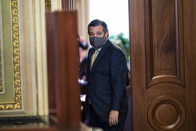Sen. Ted Cruz, R-Texas, walks out of a meeting room for the lawyers of former President Donald Trump on the fourth day of the Senate Impeachment trial for Trump on Capitol Hill on Friday, February 12, 2021. Pool photo Jabin Botsford  WAP20210212569 JabinxBotsford