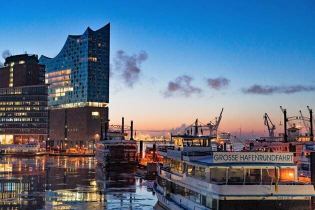 Elbphilharmonie in Hamburg Hamburg harbour at St Pauli Landungsbrücken with view towards Hafencity The Elphi at sunrise during the corona lockdown in February 2021 Elbphilharmonie in Hamburg Hamburg Hamburg harbour at St Pauli Landungsbrücken with view towards Hafencity The Elphi at sunrise during t