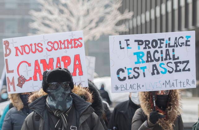 February 13, 2021, Montreal, PQ, Canada: People attend a protest called Ã¢â‚¬ËœWe are all CamaraÃ¢â‚¬â ¢ in Montreal, Saturday, February 13, 2021, calling for justice for Mamadi III Fara Camara, a man who was wrongfully arrested by police and jailed for six days. Montreal Canada  - ZUMAc35_ 20210213_zaf_c35_011 Copyright: xGrahamxHughesx