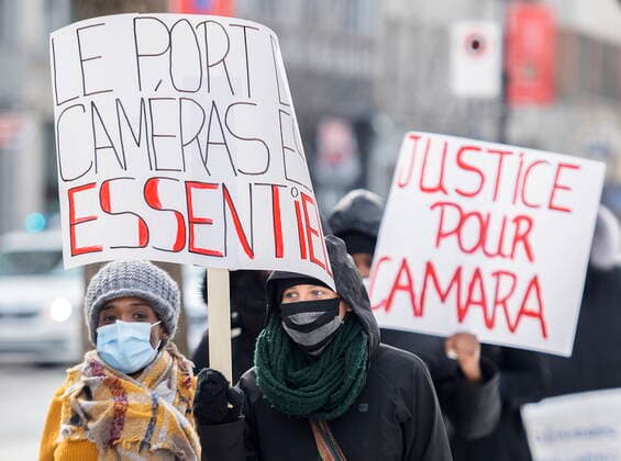 February 13, 2021, Montreal, PQ, Canada: People attend a protest called Ã¢â‚¬ËœWe are all CamaraÃ¢â‚¬â ¢ in Montreal, Saturday, February 13, 2021, calling for justice for Mamadi III Fara Camara, a man who was wrongfully arrested by police and jailed for six days. Montreal Canada  - ZUMAc35_ 20210213_zaf_c35_016 Copyright: xGrahamxHughesx