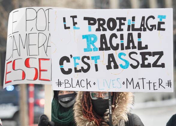 February 13, 2021, Montreal, PQ, Canada: People attend a protest called Ã¢â‚¬ËœWe are all CamaraÃ¢â‚¬â ¢ in Montreal, Saturday, February 13, 2021, calling for justice for Mamadi III Fara Camara, a man who was wrongfully arrested by police and jailed for six days. Montreal Canada  - ZUMAc35_ 20210213_zaf_c35_017 Copyright: xGrahamxHughesx