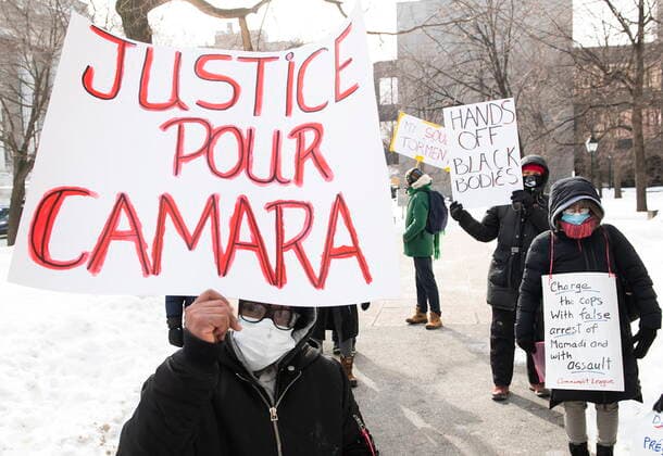February 13, 2021, Montreal, PQ, Canada: People attend a protest called Ã¢â‚¬ËœWe are all CamaraÃ¢â‚¬â ¢ in Montreal, Saturday, February 13, 2021, calling for justice for Mamadi III Fara Camara, a man who was wrongfully arrested by police and jailed for six days. Montreal Canada  - ZUMAc35_ 20210213_zaf_c35_020 Copyright: xGrahamxHughesx