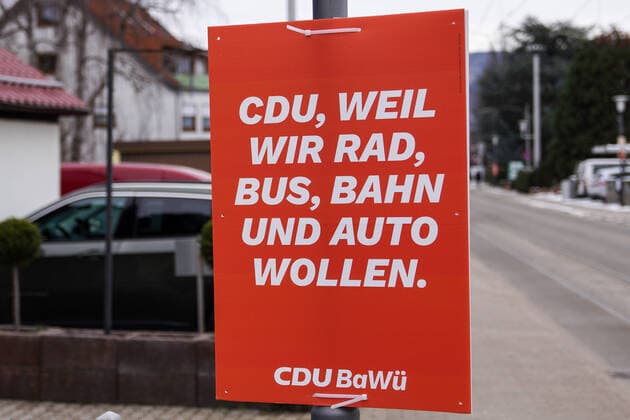 An election poster for the election for the state parliament of Baden Württemberg on 14 March, the photo shows a poster of the party CDU Christian Democratic Union of Germany with the slogan CDU, because we want bike, bus, train and car, the CDU wants everything in transport policy, election campaign in Germany, symb xozx